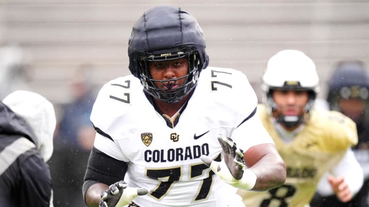 Apr 27, 2024; Boulder, CO, USA; Colorado Buffaloes offensive tackle Jordan Seaton (77) warms up during a spring game event at Folsom Field. Mandatory Credit: Ron Chenoy-USA TODAY Sports