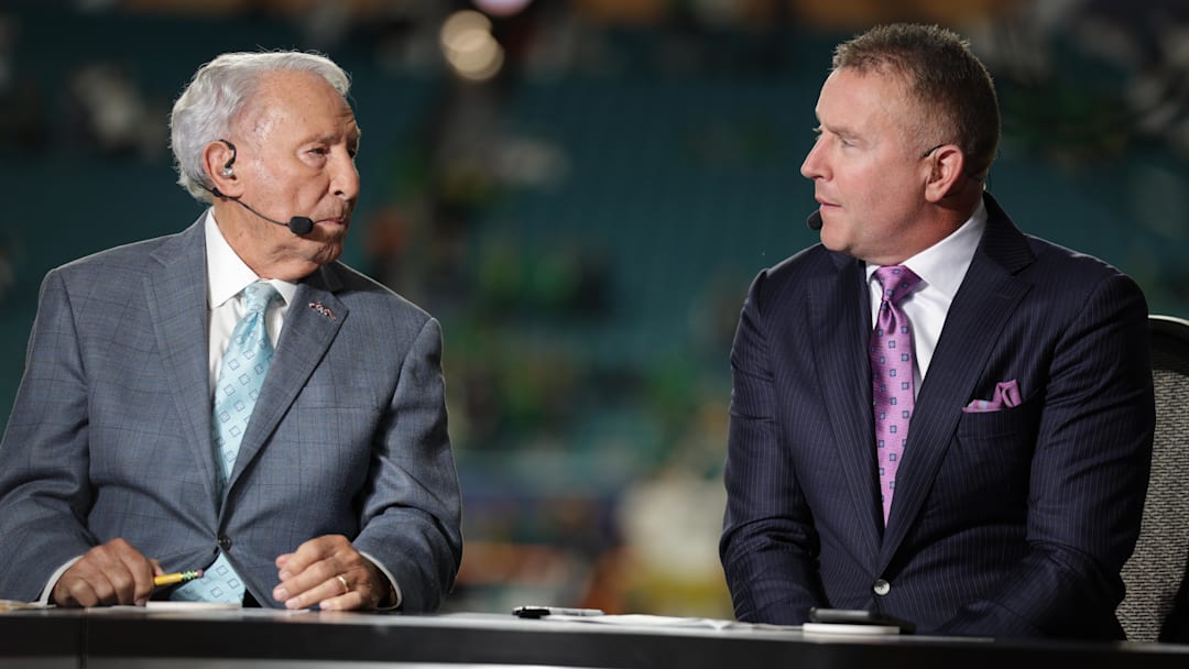 Jan 9, 2025; Miami, FL, USA; ESPN analysts Lee Corso and Kirk Herbstreit before the game between the Notre Dame Fighting Irish and the Penn State Nittany Lions in the Orange Bowl.