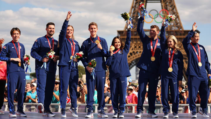 After originally finishing second in Beijing, the U.S. figure skating team traded silver for gold Wednesday.