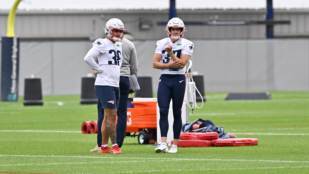 Jun 9, 2025; Foxborough, MA, USA; New England Patriots place kicker Andres Borregales (36) and New England Patriots place kicker John Parker Romo (37) wait for the start of a drill during minicamp at Gillette Stadium. Mandatory Credit: Eric Canha-Imagn Images