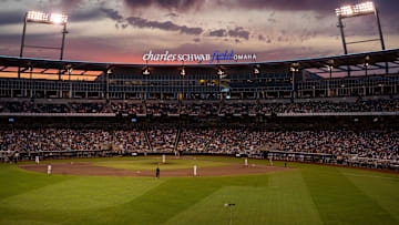 Jun 17, 2024; Omaha, NE, USA; Sunset as the Texas A&M Aggies and Kentucky Wildcats play during the ninth inning at Charles Schwab Field Omaha. Mandatory Credit: Dylan Widger-USA TODAY Sports