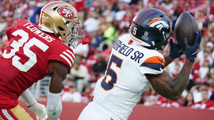 Aug 9, 2025; Santa Clara, California, USA;  Denver Broncos wide receiver Trent Sherfield Sr. (5) makes a touchdown catch over San Francisco 49ers cornerback Dallis Flowers (35) in the second quarter at Levi's Stadium. Mandatory Credit: David Gonzales-Imagn Images