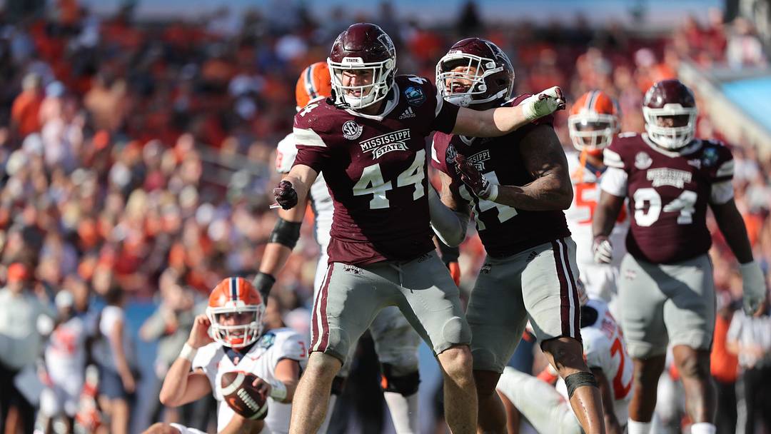 Jan 2, 2023; Tampa, FL, USA; Mississippi State Bulldogs linebacker Jett Johnson (44) celebrates after he sacked Illinois Fighting Illini wide receiver Keion Battle (83) during the second half in the 2023 ReliaQuest Bowl at Raymond James Stadium. Mandatory Credit: Kim Klement-USA TODAY Sports