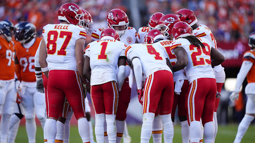 Nov 16, 2025; Denver, Colorado, USA; Members of the Kansas City Chiefs offensive squad huddle in the second quarter against the Denver Broncos at Empower Field at Mile High. Mandatory Credit: Ron Chenoy-Imagn Images