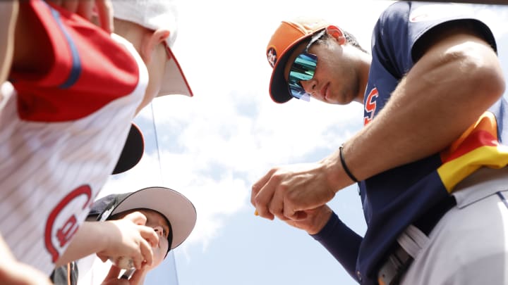 Mar 21, 2024; Jupiter, Florida, USA; Houston Astros short stop Shay Whitcomb (87) signs autographs before the game against the St. Louis Cardinals at Roger Dean Chevrolet Stadium. 