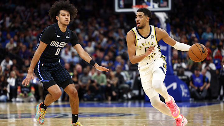 Oct 28, 2024; Orlando, Florida, USA; Indiana Pacers guard Tyrese Haliburton (0) is guarded by Orlando Magic guard Anthony Black (0) in the third quarter at Kia Center. Mandatory Credit: Nathan Ray Seebeck-Imagn Images