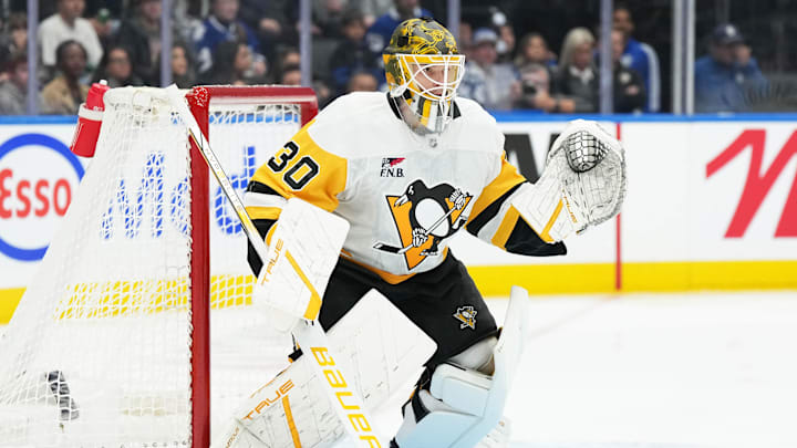 Oct 12, 2024; Toronto, Ontario, CAN; Pittsburgh Penguins goaltender Joel Blomqvist (30) follows the play against the Toronto Maple Leafs during the first period at Scotiabank Arena. Mandatory Credit: Nick Turchiaro-Imagn Images