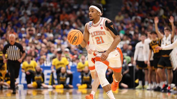 Mar 20, 2026; Tampa, FL, USA; Clemson Tigers guard Ace Buckner (21) moves the ball in the second half against the Iowa Hawkeyes during a first round game of the men's 2026 NCAA Tournament at Benchmark International Arena. Mandatory Credit: Nathan Ray Seebeck-Imagn Images