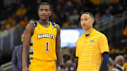 Jan 24, 2025; Milwaukee, Wisconsin, USA;  Marquette Golden Eagles head coach Shaka Smart talks with guard Kam Jones (1) during the second half against the Villanova Wildcats at Fiserv Forum. Mandatory Credit: Jeff Hanisch-Imagn Images