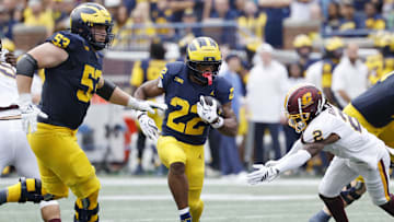 Sep 13, 2025; Ann Arbor, Michigan, USA;  Michigan Wolverines running back Justice Haynes (22) rushes in the first half against the Central Michigan Chippewas at Michigan Stadium. Mandatory Credit: Rick Osentoski-Imagn Images