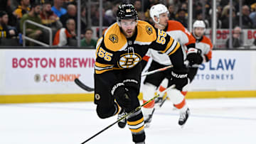Oct 1, 2024; Boston, Massachusetts, USA; Boston Bruins right wing Justin Brazeau (55) skates against the Philadelphia Flyers during the first period at the TD Garden. Mandatory Credit: Brian Fluharty-Imagn Images