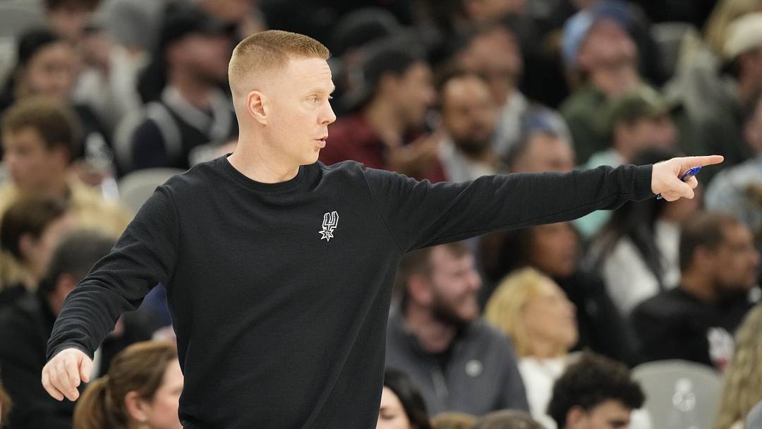Dec 2, 2025; San Antonio, Texas, USA; San Antonio Spurs assistant head coach Sean Sweeney signals to players during the second half against the Memphis Grizzlies at Frost Bank Center. Mandatory Credit: Scott Wachter-Imagn Images