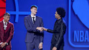 Jun 25, 2025; Brooklyn, NY, USA; Cooper Flagg and Dylan Harper shake hands on stage before the 2025 NBA Draft at Barclays Center. Mandatory Credit: Brad Penner-Imagn Images
