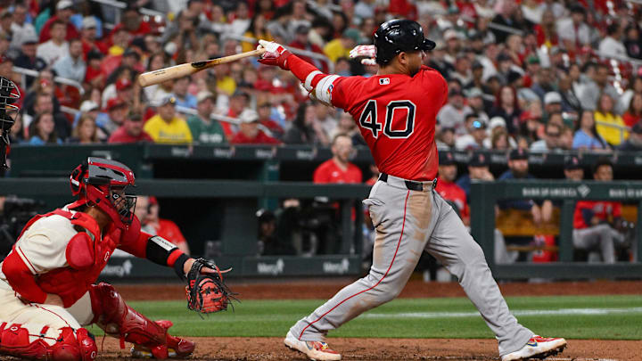 Apr 11, 2026; St. Louis, Missouri, USA; Boston Red Sox first baseman Willson Contreras (40) hits a one run single against the St. Louis Cardinals during the ninth inning at Busch Stadium. Mandatory Credit: Jeff Curry-Imagn Images