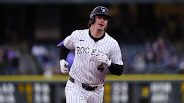 May 7, 2025; Denver, Colorado, USA; Colorado Rockies first base Michael Toglia (4) runs off a two run home run in the third inning against the Detroit Tigers at Coors Field. Mandatory Credit: Ron Chenoy-Imagn Images