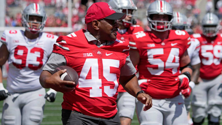 Two-time Heisman Trophy winner Archie Griffin runs for a ceremonial touchdown during the third quarter.