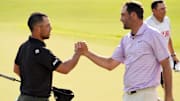 Scheffler (right) leads Schauffele by five shots and Collin Morikawa by four entering the weekend at East Lake.