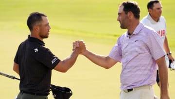 Scheffler (right) leads Schauffele by five shots and Collin Morikawa by four entering the weekend at East Lake.