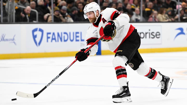 Jan 23, 2025; Boston, Massachusetts, USA; Ottawa Senators right wing Claude Giroux (28) takes a shot against the Boston Bruins during the second period at the TD Garden. Mandatory Credit: Brian Fluharty-Imagn Images