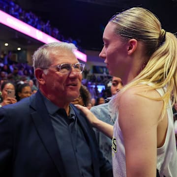 University of Connecticut head coach Auriemma speaks with Dallas Wings guard Bueckers after the game against the Golden State Valkyries at College Park Center. 