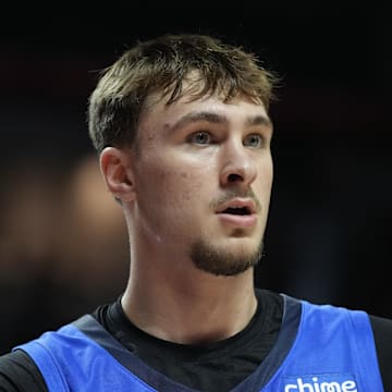 Jul 12, 2025; Las Vegas, NV, USA; Dallas Mavericks forward Cooper Flagg (32) looks on against the San Antonio Spurs in the second quarter of their game at Thomas & Mack Center. Mandatory Credit: Candice Ward-Imagn Images