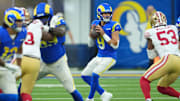 Oct 2, 2025; Inglewood, California, USA; Los Angeles Rams quarterback Matthew Stafford (9) drops back to pass against the San Francisco 49ers during the first half at SoFi Stadium. Mandatory Credit: Kirby Lee-Imagn Images