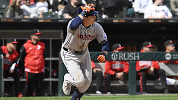 May 3, 2025; Chicago, Illinois, USA;  Houston Astros outfielder Jake Meyers (6) holds his helmet after he hit an RBI double during the eighth inning against the Chicago White Sox at Rate Field. 