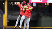 Sep 27, 2025; Milwaukee, Wisconsin, USA;  Cincinnati Reds shortstop Elly De La Cruz (44) and outfielder Noelvi Marte (16) celebrate following the game against the Milwaukee Brewers at American Family Field. Mandatory Credit: Jeff Hanisch-Imagn Images