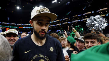 Jun 17, 2024; Boston, Massachusetts, USA; Boston Celtics guard Derrick White (9) walks off the court after beating the Dallas Mavericks in game five of the 2024 NBA Finals at TD Garden. Mandatory Credit: Peter Casey-USA TODAY Sports