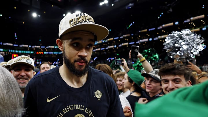 Jun 17, 2024; Boston, Massachusetts, USA; Boston Celtics guard Derrick White (9) walks off the court after beating the Dallas Mavericks in game five of the 2024 NBA Finals at TD Garden. Mandatory Credit: Peter Casey-USA TODAY Sports