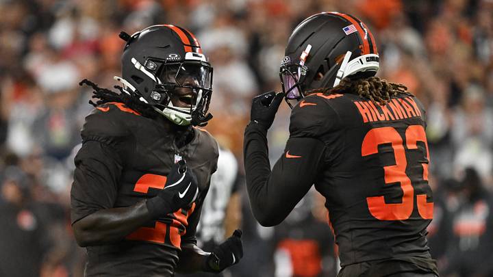 Cleveland Browns safety Emmanuel McNeil-Warren, left, reacts with  safety Ronnie Hickman.
