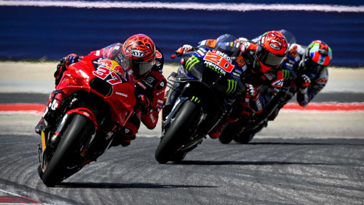 Apr 14, 2024; Austin, TX, USA; Augusto Fernandez (37) of Spain and Red Bull Tech3 GASGAS and Fabio Quartararo (20) of France and Monster Energy Yamaha MotoGP rides during the MotoGP Grand Prix of The Americas at Circuit of The Americas. Mandatory Credit: Jerome Miron-USA TODAY Sports