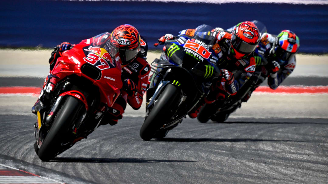 Apr 14, 2024; Austin, TX, USA; Augusto Fernandez (37) of Spain and Red Bull Tech3 GASGAS and Fabio Quartararo (20) of France and Monster Energy Yamaha MotoGP rides during the MotoGP Grand Prix of The Americas at Circuit of The Americas. Mandatory Credit: Jerome Miron-USA TODAY Sports