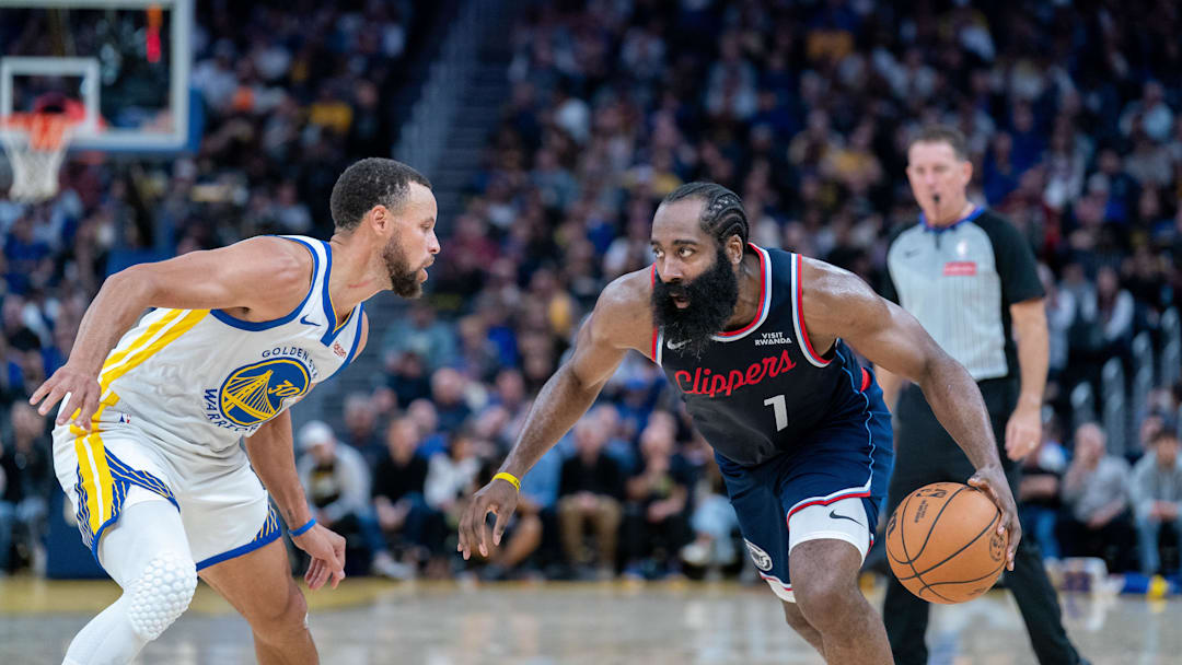 Oct 28, 2025; San Francisco, California, USA; LA Clippers guard James Harden (1) drives to the net against Golden State Warriors guard Stephen Curry (30) during the third quarter at Chase Center. Mandatory Credit: Neville E. Guard-Imagn Images Oct 28, 2025; San Francisco, California, USA; LA Clippers guard James Harden (1) drives to the net against Golden State Warriors guard Stephen Curry (30) during the third quarter at Chase Center. Mandatory Credit: Neville E. Guard-Imagn Images