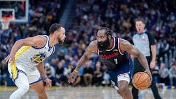 Oct 28, 2025; San Francisco, California, USA; LA Clippers guard James Harden (1) drives to the net against Golden State Warriors guard Stephen Curry (30) during the third quarter at Chase Center. Mandatory Credit: Neville E. Guard-Imagn Images