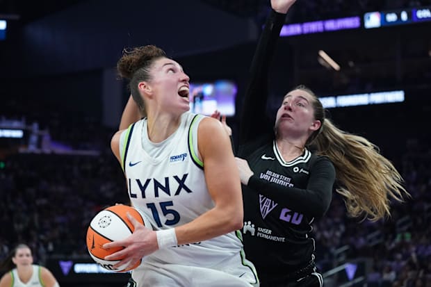 Minnesota Lynx forward Jessica Shepard looks to shoot while defended by Golden State Valkyries guard Kate Martin. 