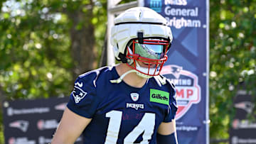 Jul 23, 2025; Foxborough, MA, USA; New England Patriots linebacker Robert Spillane (14) walks to the practice fields for training camp at Gillette Stadium. Mandatory Credit: Eric Canha-Imagn Images