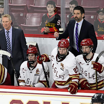 Feb 28, 2025; Chestnut Hill, MA, USA; Boston College Eagles head coach Greg Brown (center) looks on during the third period against the University of New Hampshire Wildcats at Conte Forum. Mandatory Credit: Eric Canha-Imagn Images