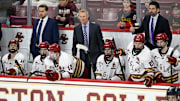 Feb 28, 2025; Chestnut Hill, MA, USA; Boston College Eagles head coach Greg Brown (center) looks on during the third period against the University of New Hampshire Wildcats at Conte Forum. Mandatory Credit: Eric Canha-Imagn Images