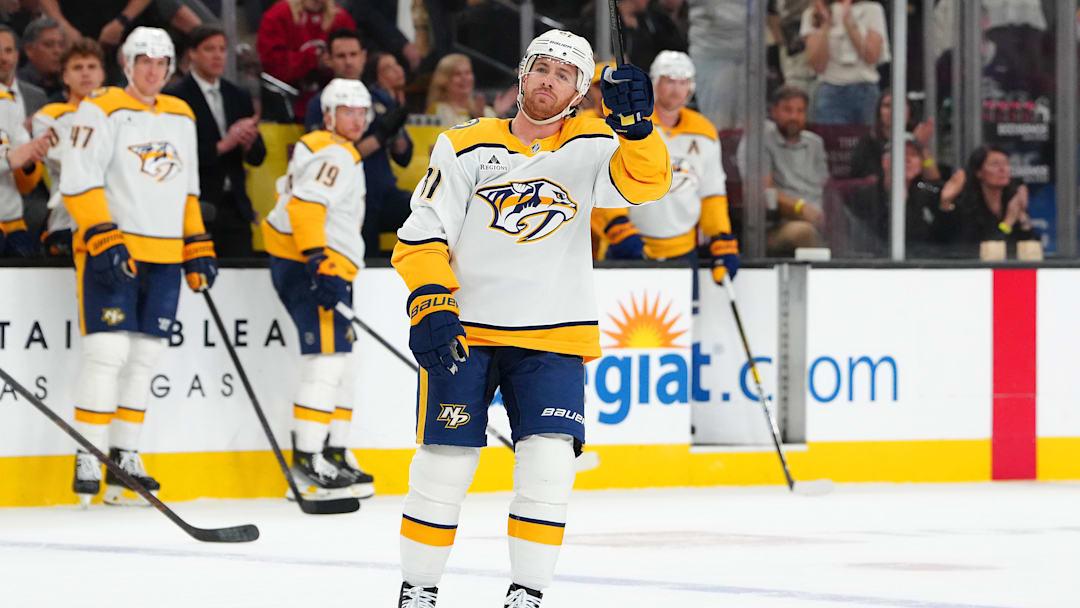 Apr 12, 2025; Las Vegas, Nevada, USA; Nashville Predators center Jonathan Marchessault (81) salutes the crowd while being recognized for his return to play against the Vegas Golden Knights during the first period at T-Mobile Arena. Mandatory Credit: Stephen R. Sylvanie-Imagn Images