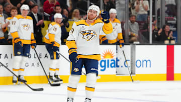 Apr 12, 2025; Las Vegas, Nevada, USA; Nashville Predators center Jonathan Marchessault (81) salutes the crowd while being recognized for his return to play against the Vegas Golden Knights during the first period at T-Mobile Arena. Mandatory Credit: Stephen R. Sylvanie-Imagn Images