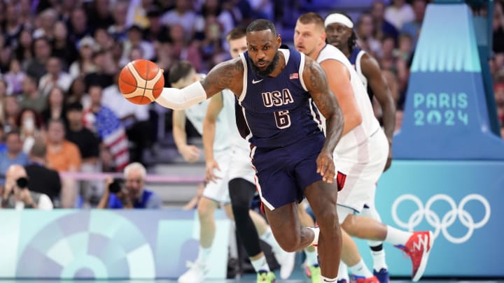 Jul 28, 2024; Villeneuve-d'Ascq, France; United States forward Lebron James (6) dribbles in the first quarter against Serbia during the Paris 2024 Olympic Summer Games at Stade Pierre-Mauroy. Mandatory Credit: John David Mercer-USA TODAY Sports