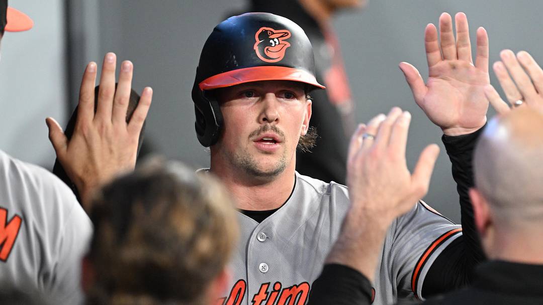 Jun 5, 2026; Toronto, Ontario, CAN;  Baltimore Orioles catcher Adley Rutschman (35) celebrates with team mates in the dugout after scoring a run against the Toronto Blue Jays in the sixth inning at Rogers Centre. Mandatory Credit: Dan Hamilton-Imagn Images