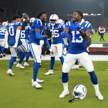 Nov 9, 2025; Berlin, Germany; Indianapolis Colts cornerback Sauce Gardner (1), wide receiver Laquon Treadwell (13) and wide receiver Alec Pierce (14)] celebrate after overtime win over the Atlanta Falcons in the NFL Berlin Game at Olympic Stadium. 