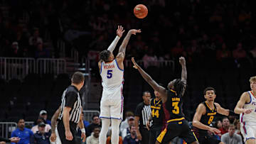 Dec 14, 2024; Atlanta, Georgia, USA; Florida Gators guard Will Richard (5) shoots the ball over Arizona State Sun Devils guard Joson Sanon (3) during the second half at State Farm Arena. Mandatory Credit: Jordan Godfree-Imagn Images