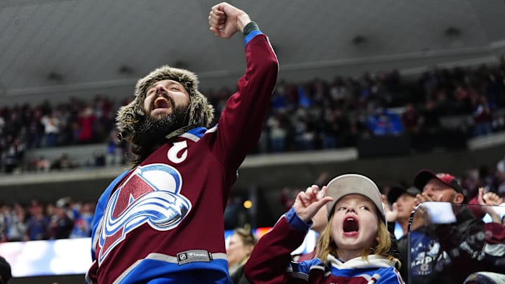 Jan 23, 2026; Denver, Colorado, USA; Colorado Avalanche fans celebrate a goal scored in the second period against the Philadelphia Flyers at Ball Arena. Mandatory Credit: Ron Chenoy-Imagn Images