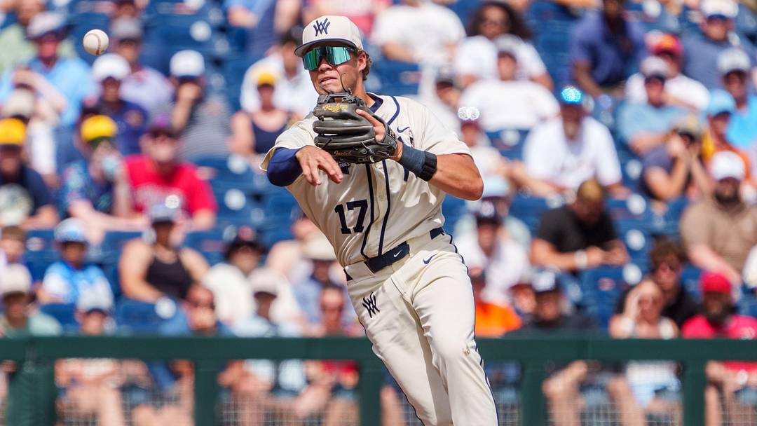 Jun 12, 2026; Omaha, NE, USA; West Virginia Mountaineers shortstop Matthew Ineich (17) throws to first for an out against the Troy Trojans during the eighth inning at Charles Schwab Field. Mandatory Credit: Dylan Widger-Imagn Images Jun 12, 2026; Omaha, NE, USA; West Virginia Mountaineers shortstop Matthew Ineich (17) throws to first for an out against the Troy Trojans during the eighth inning at Charles Schwab Field. Mandatory Credit: Dylan Widger-Imagn Images