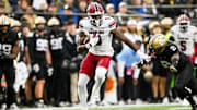 Nov 9, 2024; Nashville, Tennessee, USA;  South Carolina Gamecocks wide receiver Nyck Harbor (8) runs the ball after a made catch against the Vanderbilt Commodores during the first half at FirstBank Stadium. Mandatory Credit: Steve Roberts-Imagn Images