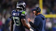 Oct 20, 2025; Seattle, Washington, USA; Seattle Seahawks linebacker Ernest Jones IV (13) talks with Seattle Seahawks head coach Mike Macdonald during the fourth quarter against the Houston Texans at Lumen Field.