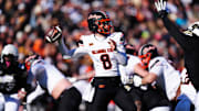 Nov 29, 2024; Boulder, Colorado, USA; Oklahoma State Cowboys quarterback Maealiuaki Smith (8 prepares to pass the ball in the second quarter against the Colorado Buffaloes at Folsom Field. Mandatory Credit: Ron Chenoy-Imagn Images